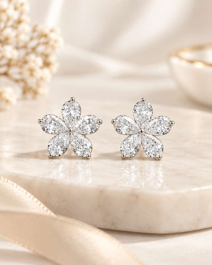 18ct white gold lab-grown pear-shape flower stud earrings — styled