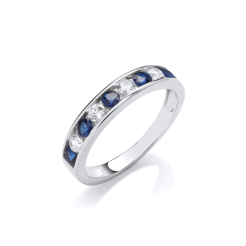 channel ring band in silver sapphire 