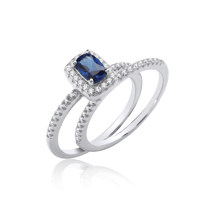 Blue Emerald Cut Eternity CZ Bridal Set Ring In Silver