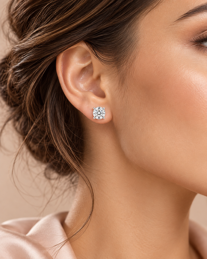 Woman wearing lab-grown diamond stud earring