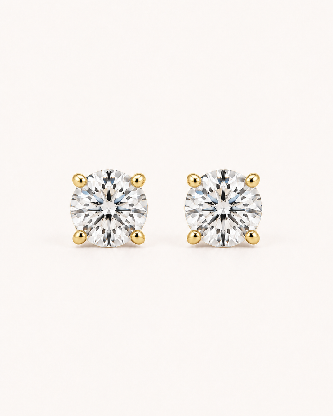 Pair of lab-grown diamond studs, front view