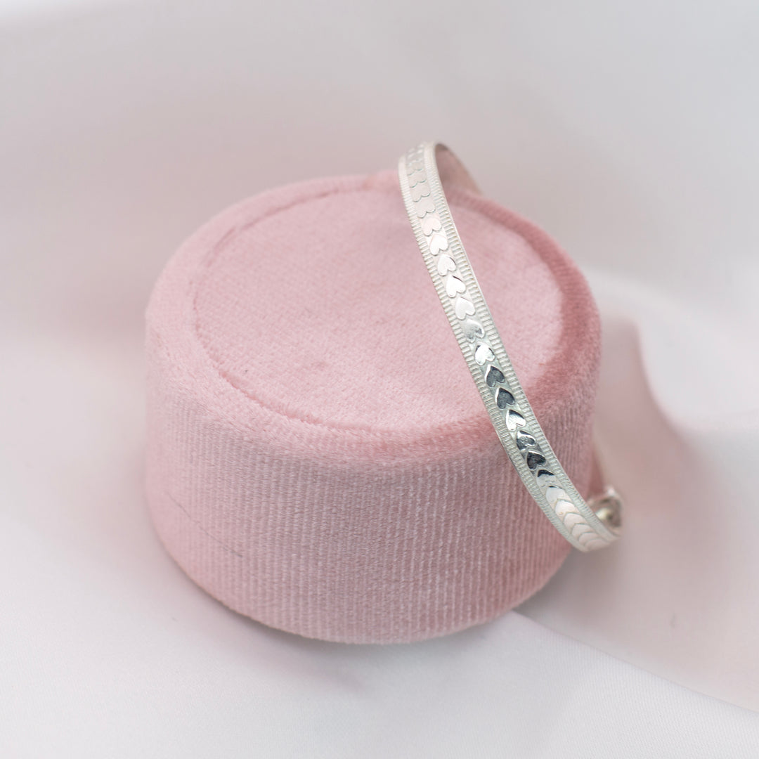 Expandable Baby Bangle With Embossed Hearts In Silver