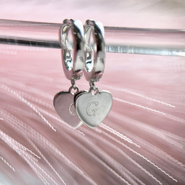 Engraved Initial Heart Charm Hinged Huggies Earrings In Silver