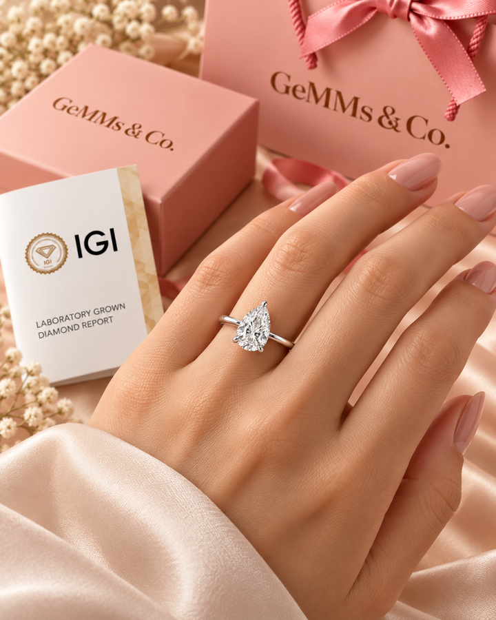 18ct White Gold 1.00ct Pear Cut Lab Grown Diamond Ring - model hand image