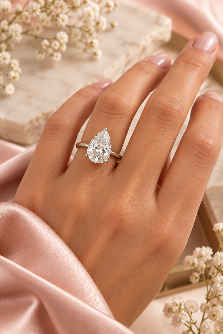 18ct White Gold 3.00ct Pear Cut Lab Grown Diamond Ring - model hand image