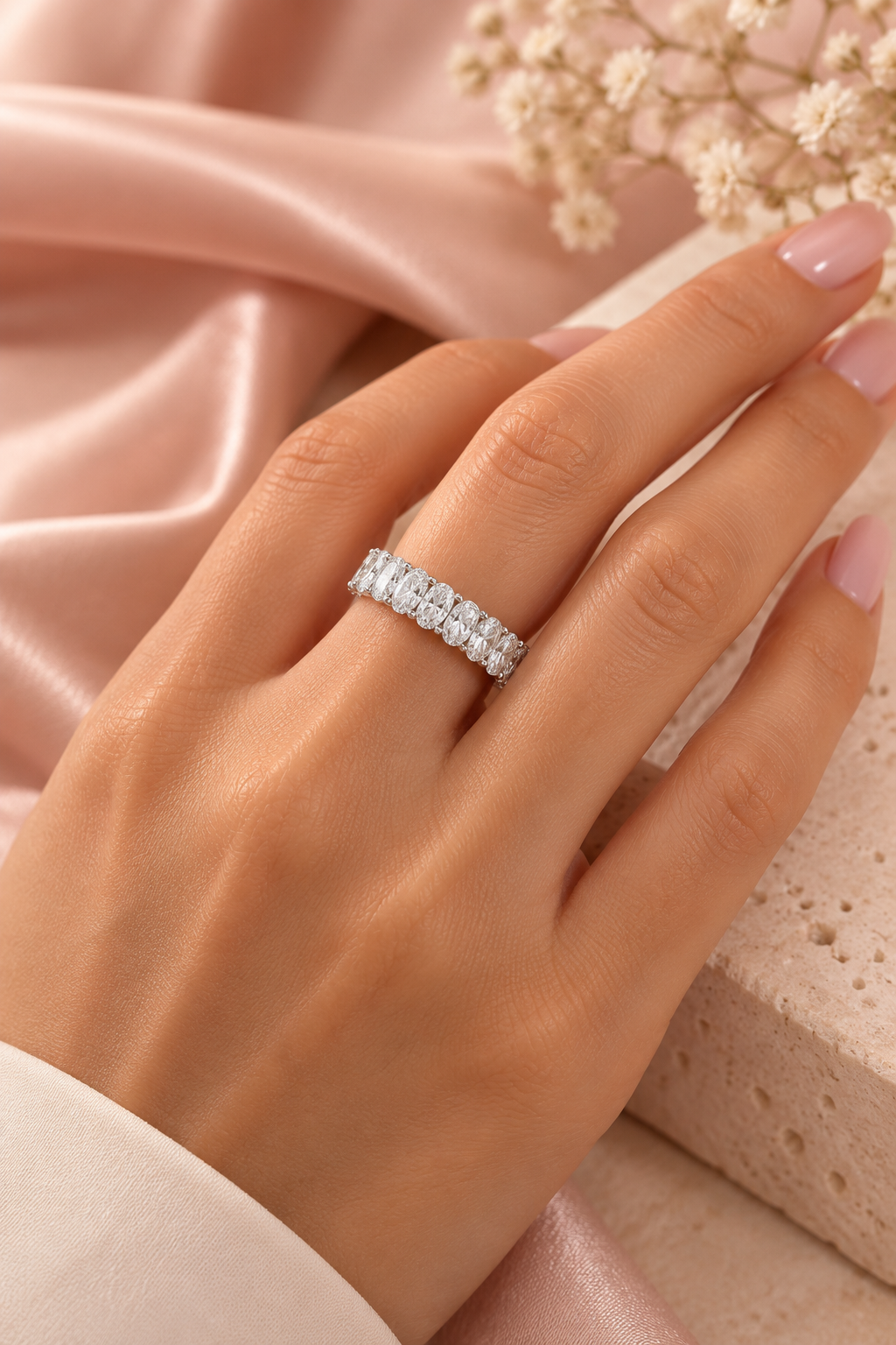18ct White Gold 7.00ct Oval Cut Lab Grown Diamond Eternity Ring - model hand image