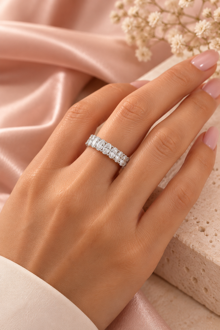 18ct White Gold 7.00ct Oval Cut Lab Grown Diamond Eternity Ring - model hand image