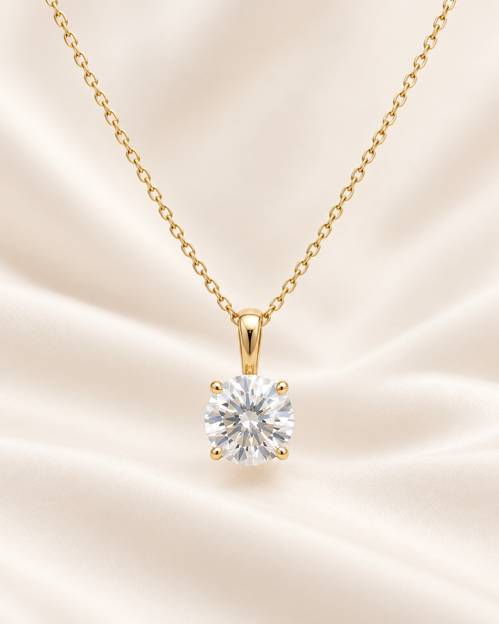 Classic round solitaire pendant necklace in 9ct Yellow Gold on cream satin #metal_9ct-yellow-gold