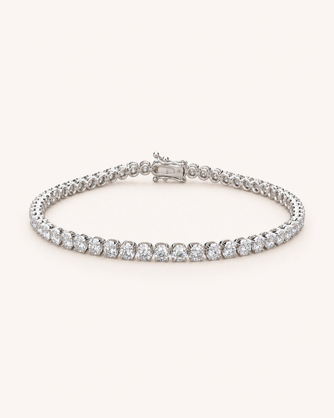 Lab-Grown Diamond Crown-Set Tennis Bracelet on GeMMs & Co. cream background