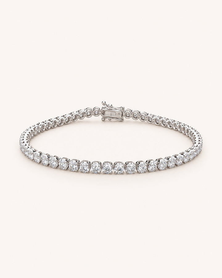 Lab-Grown Diamond Crown-Set Tennis Bracelet on GeMMs & Co. cream background