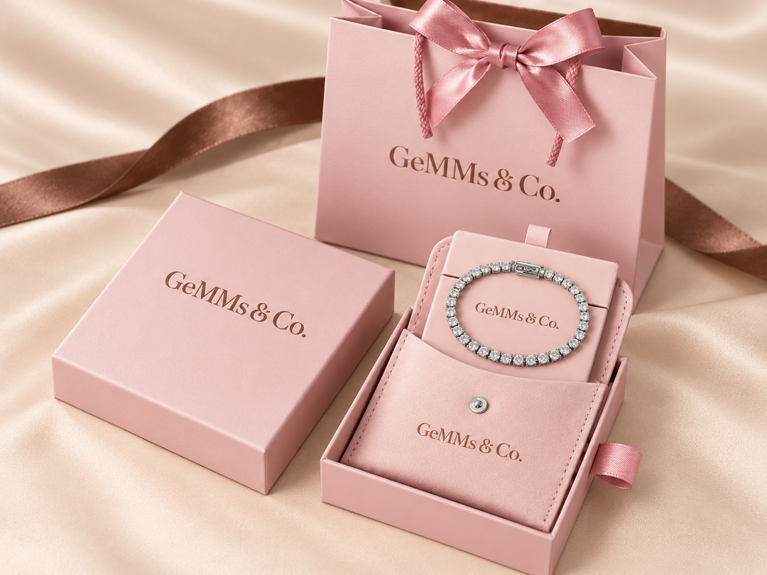 Crown-set tennis bracelet in GeMMs & Co. pink luxury packaging with pouch