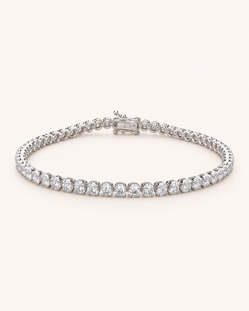 Crown-set lab-grown diamond tennis bracelet on soft ivory background