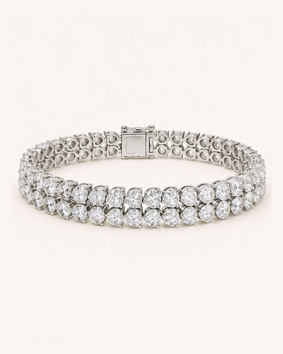 Double Row Pear Shape Lab-Grown Diamond Tennis Bracelet on GeMMs & Co. cream background