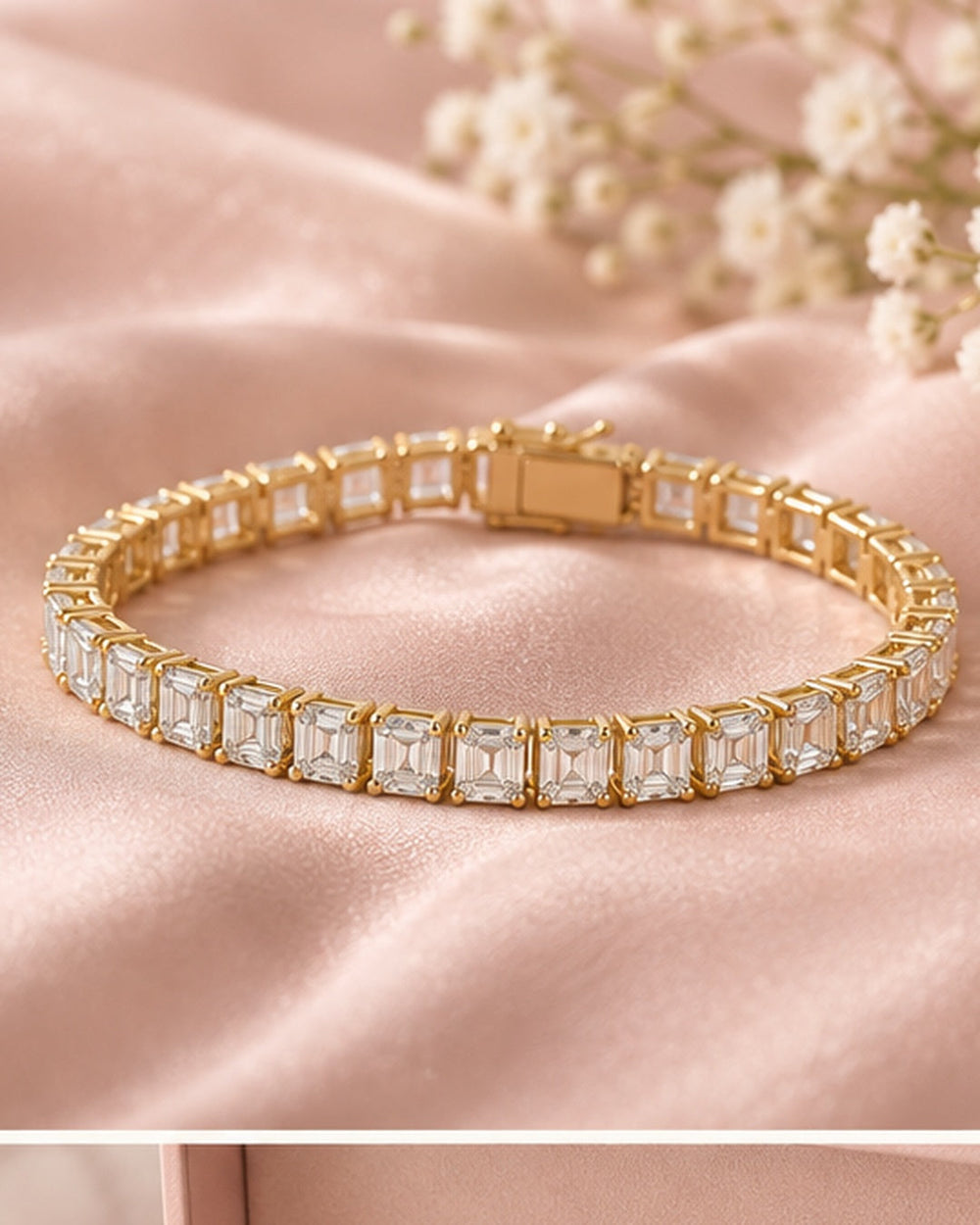 Emerald cut lab-grown diamond tennis bracelet in 9ct yellow gold on blush satin