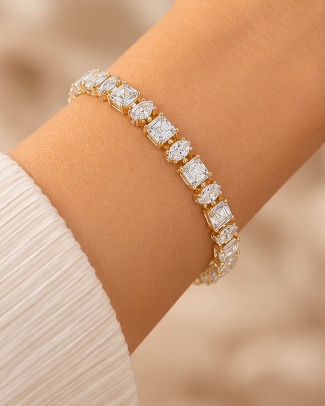 Emerald and Marquise lab-grown diamond tennis bracelet worn on wrist