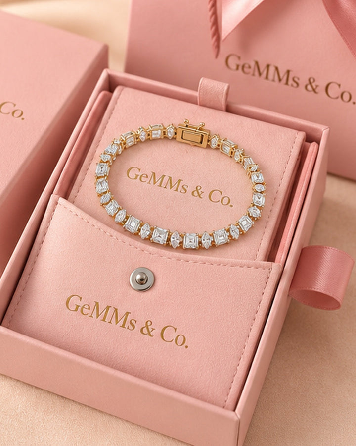 Emerald and Marquise lab-grown diamond tennis bracelet in GeMMs & Co. pink luxury packaging