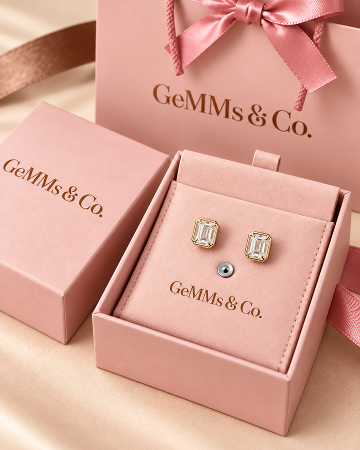 Emerald-cut rub-over lab-grown diamond studs in 9ct yellow gold — packaging #metal_9ct-yellow-gold