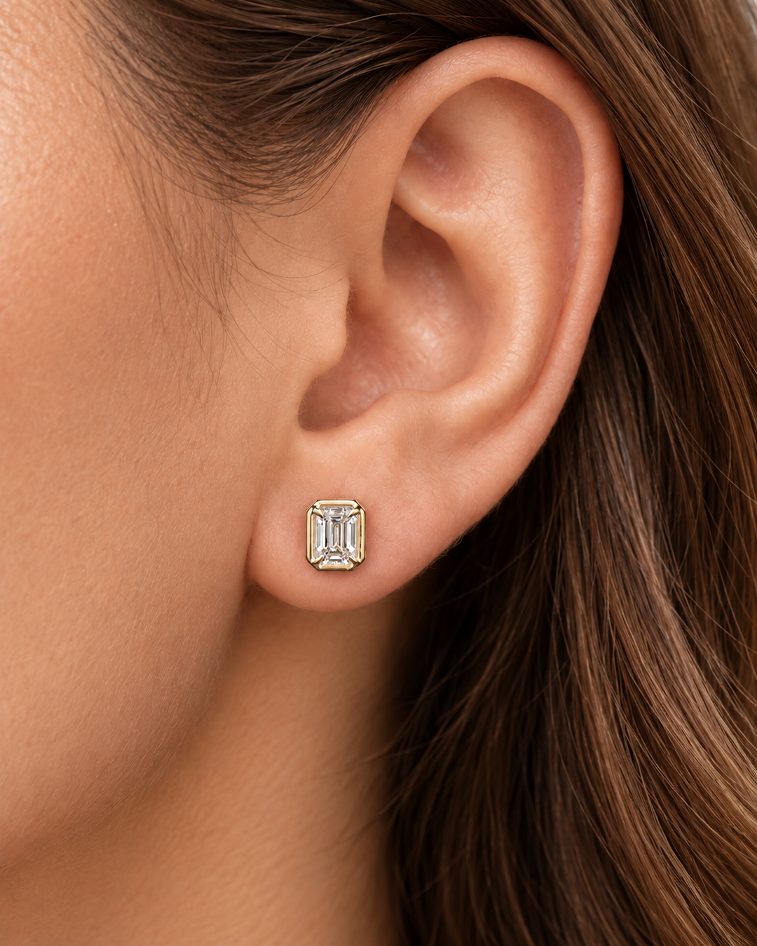 Emerald-cut rub-over lab-grown diamond studs in 9ct yellow gold — worn #metal_9ct-yellow-gold