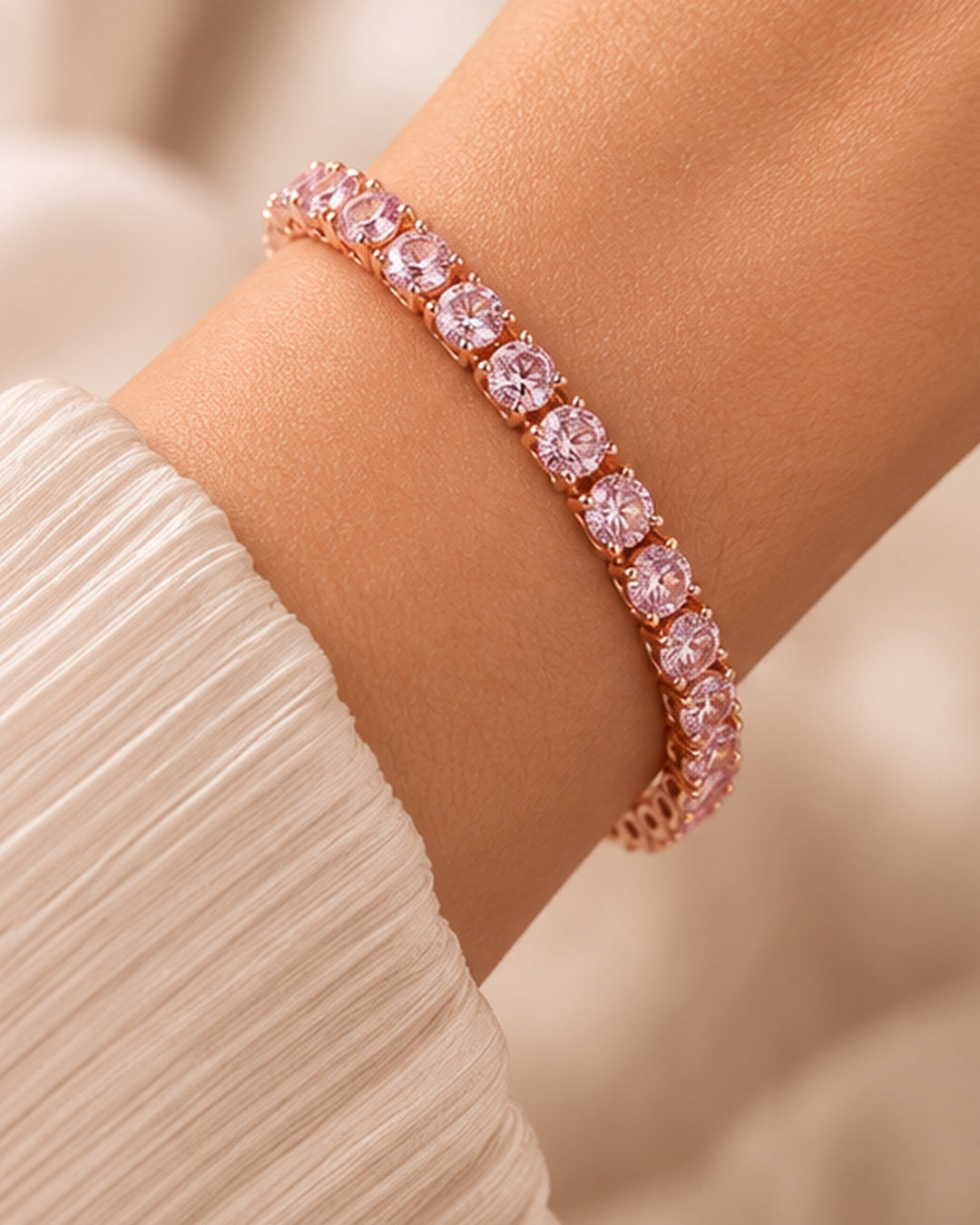 Fancy coloured crown-set lab-grown diamond tennis bracelet worn on wrist