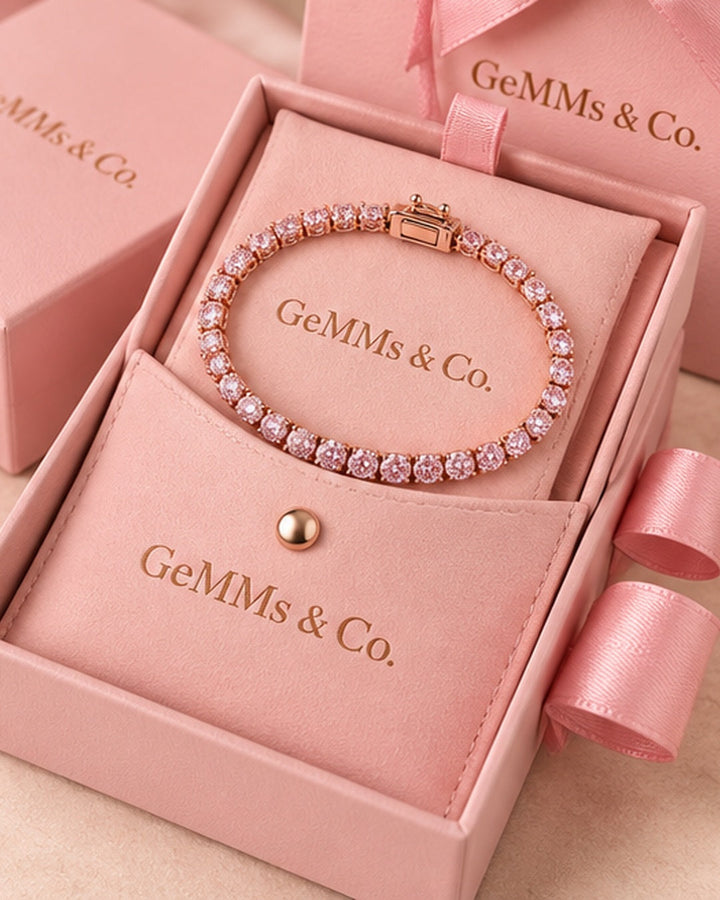Fancy coloured crown-set lab-grown diamond tennis bracelet in GeMMs & Co. luxury pink packaging