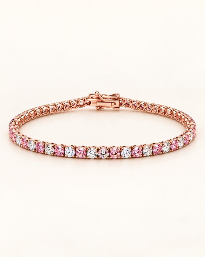 Fancy Coloured Lab-Grown Diamond Crown Tennis Bracelet in 18ct rose gold with alternating pink and white diamonds on cream background