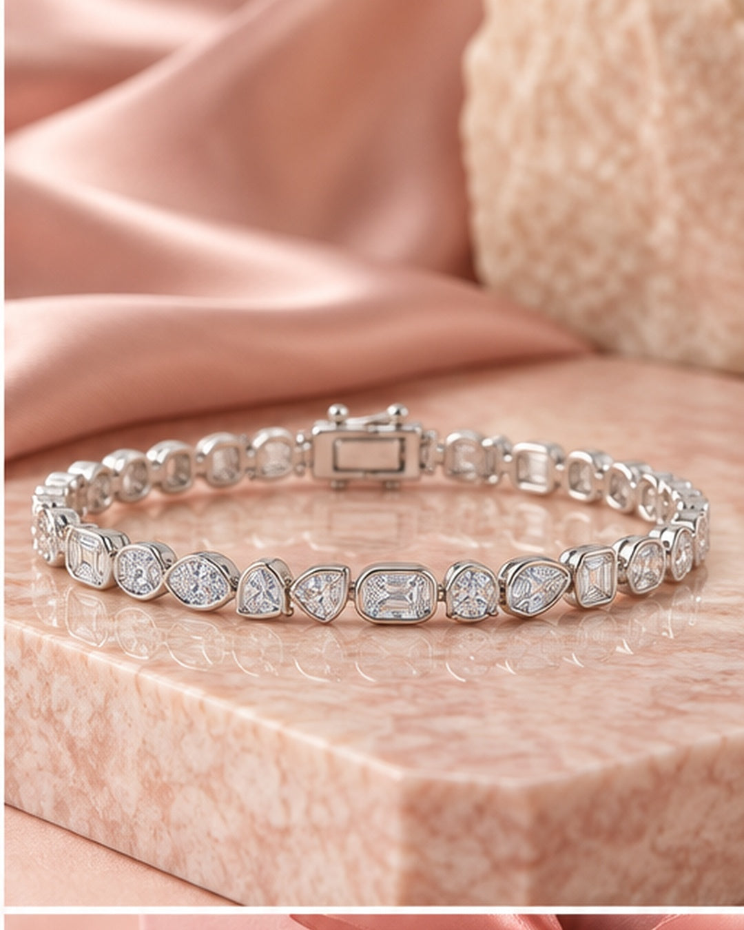 Fancy shaped rub-over lab-grown diamond tennis bracelet styled on blush satin