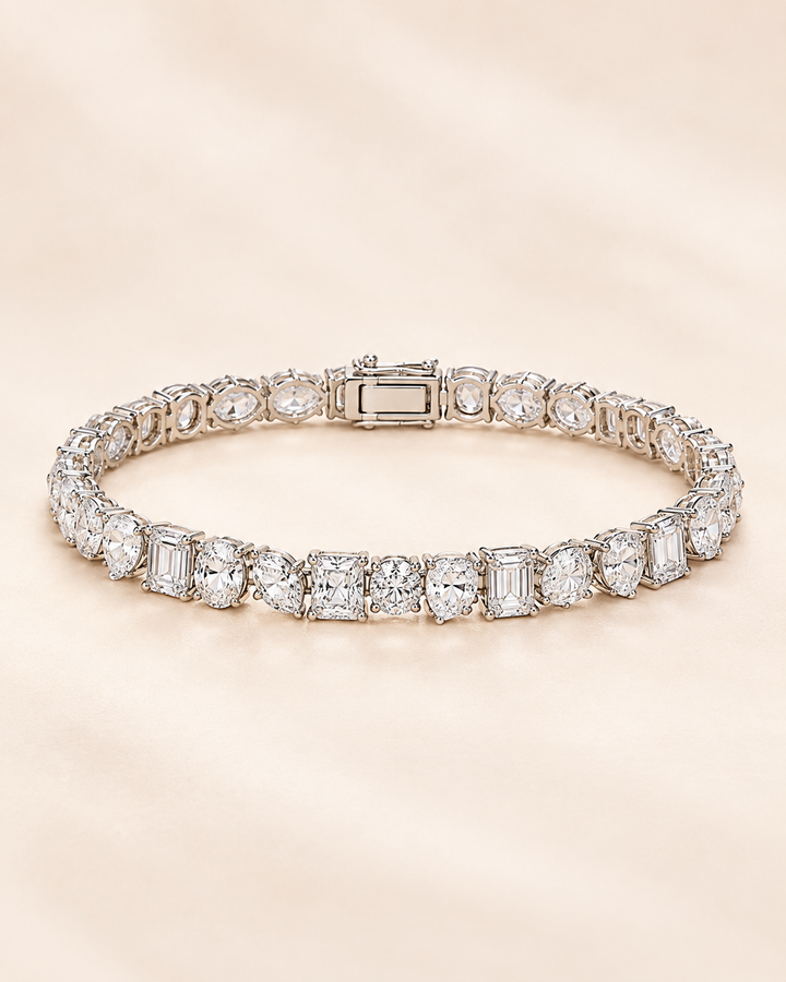 Fancy Shaped lab-grown diamond tennis bracelet on cream background