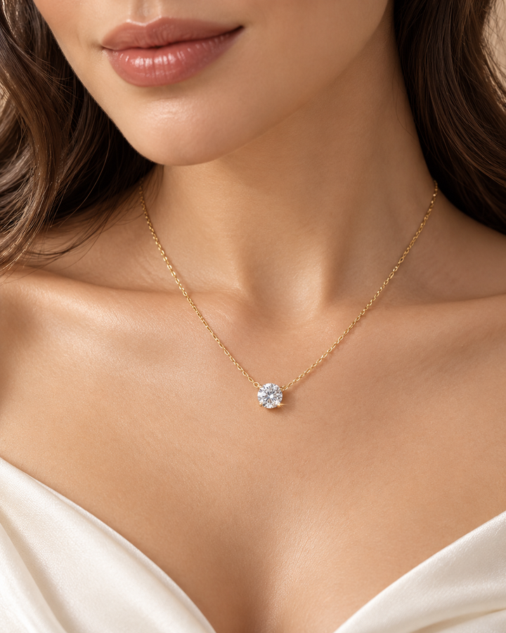 Floating solitaire necklace in 9ct Yellow Gold worn on model #metal_9ct-yellow-gold