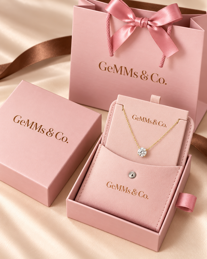 GeMMs & Co. luxury packaging with floating solitaire necklace #metal_9ct-yellow-gold
