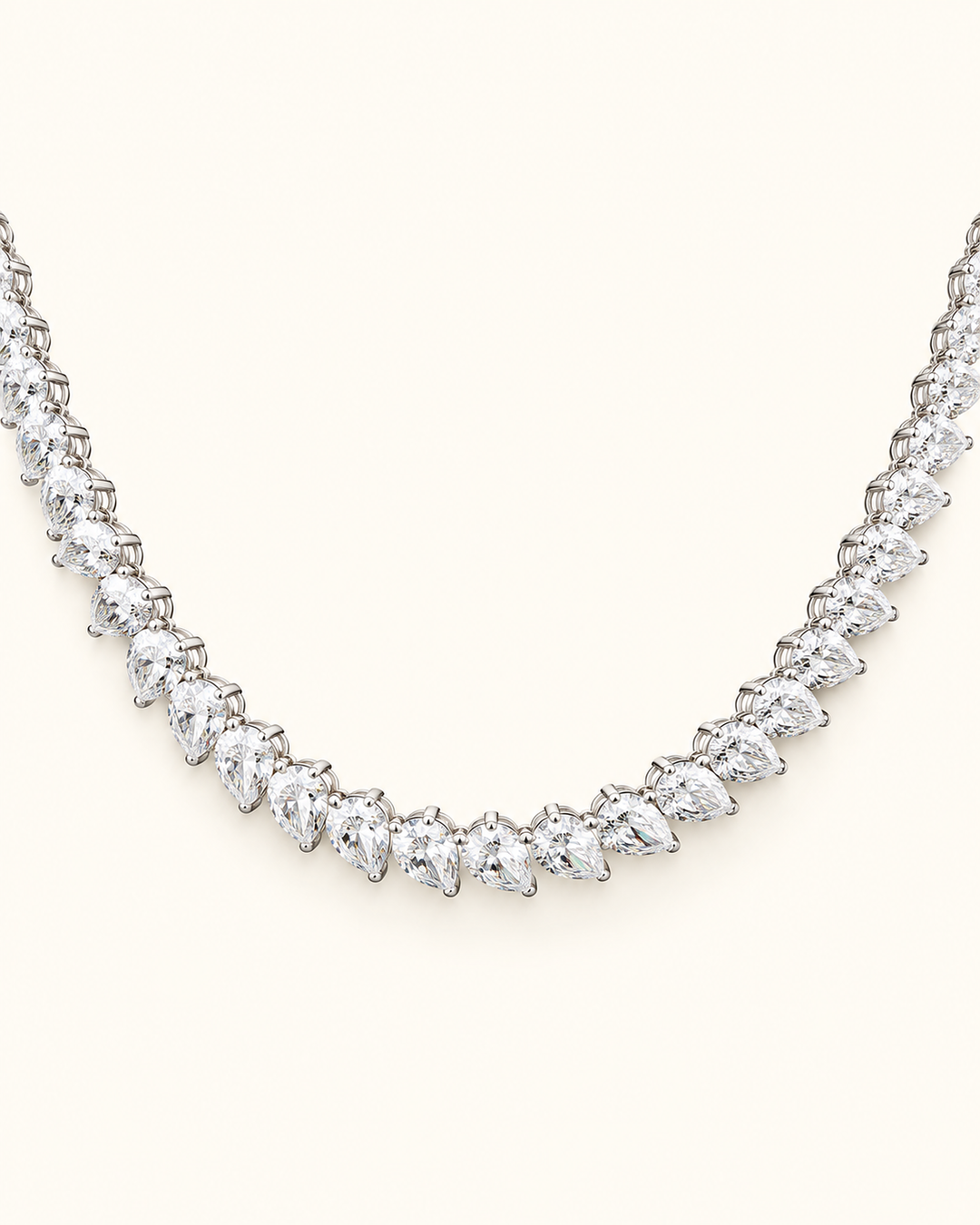 18.58ct pear-cut lab-grown diamond tennis necklace 9ct white gold on cream #metal_9ct-white-gold