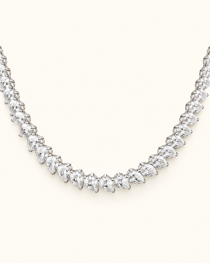 18.58ct pear-cut lab-grown diamond tennis necklace 9ct white gold on cream #metal_9ct-white-gold