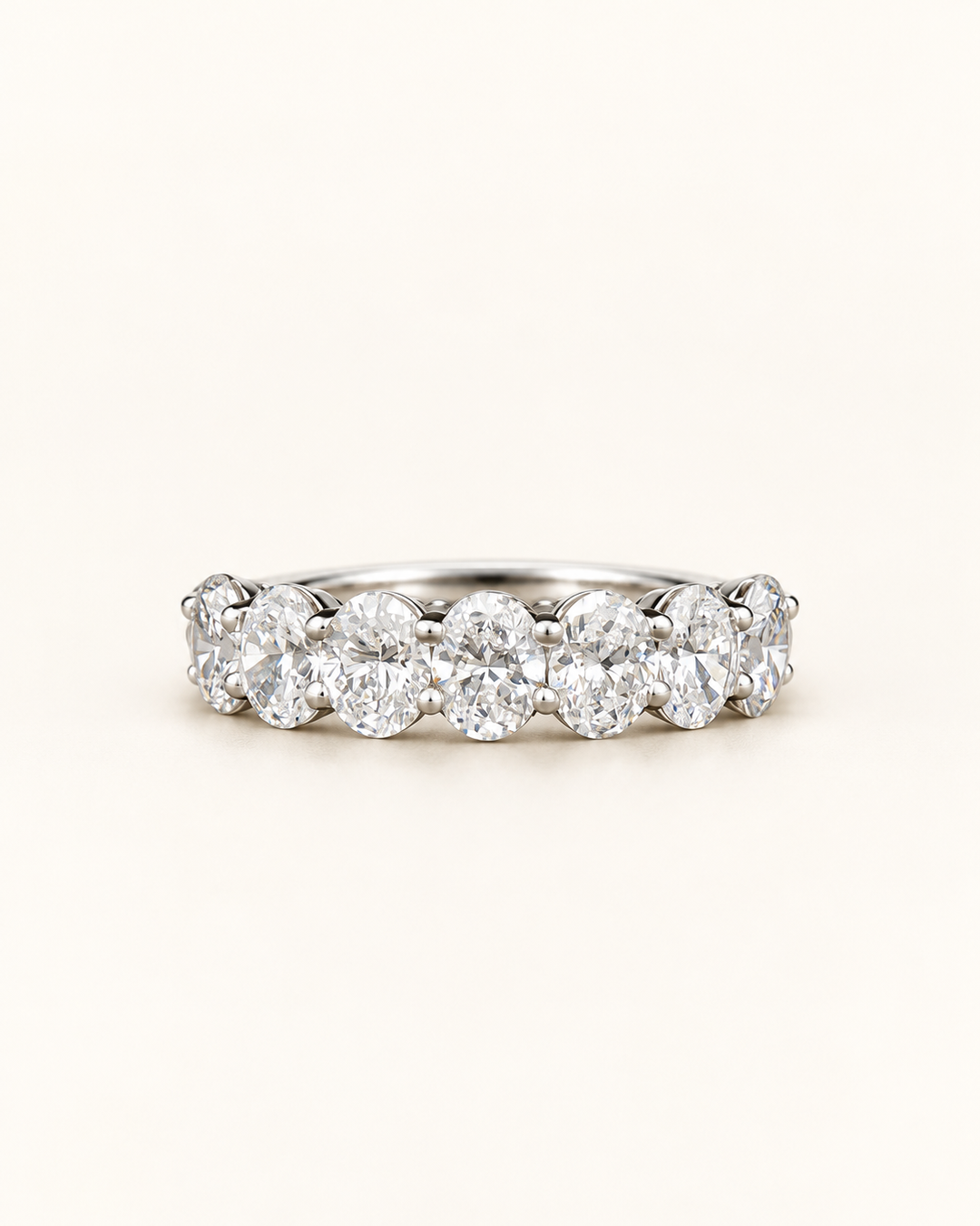 2.10ct platinum lab-grown round diamond half eternity ring on a cream background