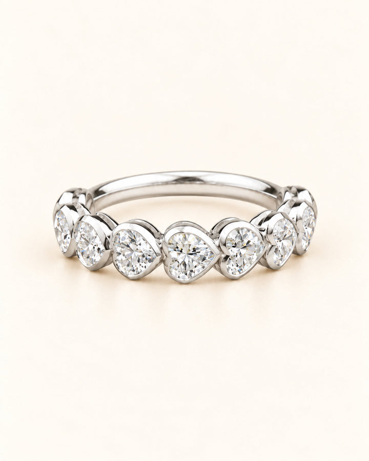 White gold heart diamond half eternity ring alternate angle #metal_9ct-white-gold