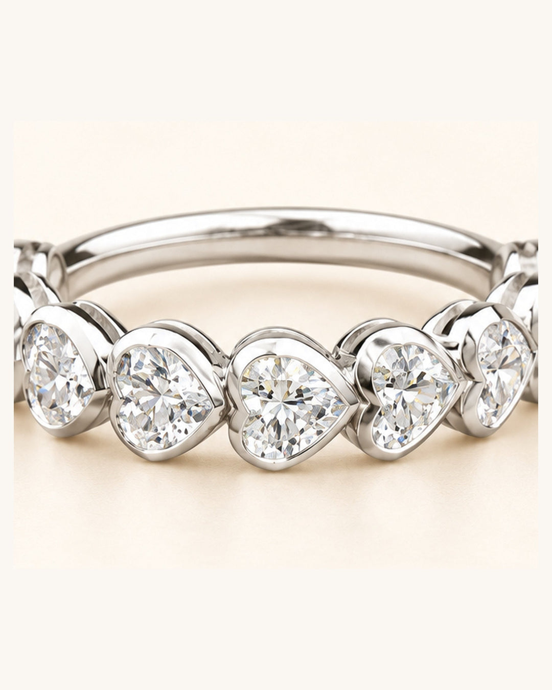 White gold bezel-set heart-cut diamond ring closeup #metal_9ct-white-gold