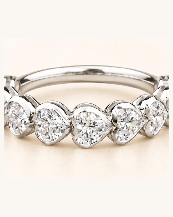 White gold bezel-set heart-cut diamond ring closeup #metal_9ct-white-gold
