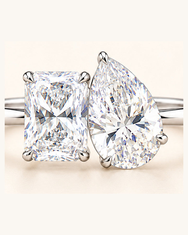 Pear and radiant Toi et Moi setting close-up #metal_18ct-white-gold
