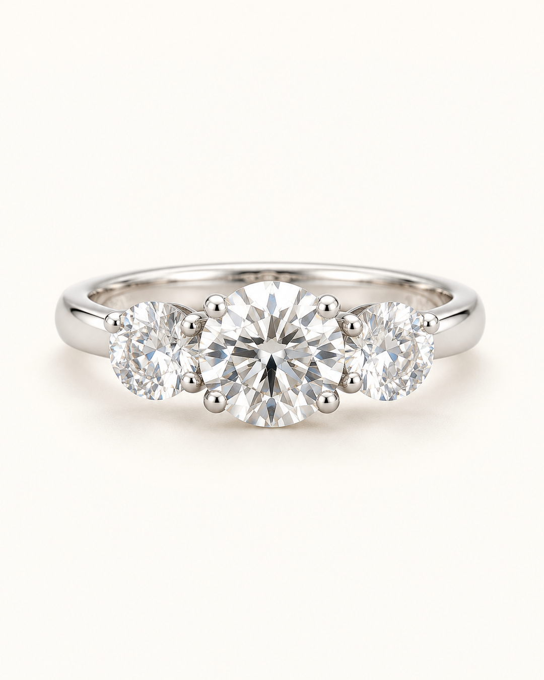 Cream-background main image of 5.53ct three-stone lab-grown diamond ring in 9ct white gold — AI-styled product photograph
