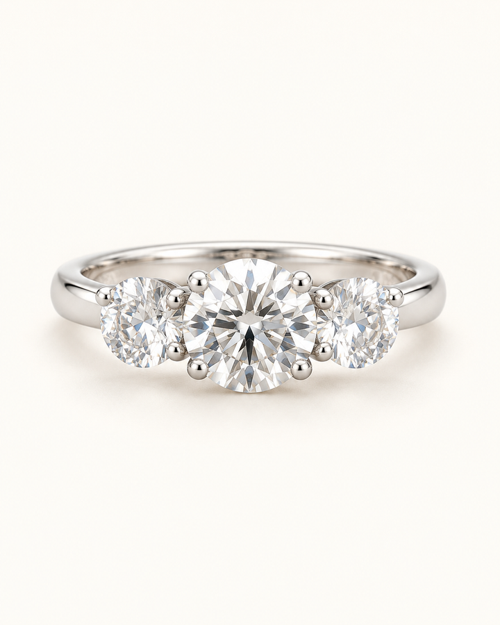 Cream-background main image of 5.53ct three-stone lab-grown diamond ring in 9ct white gold — AI-styled product photograph