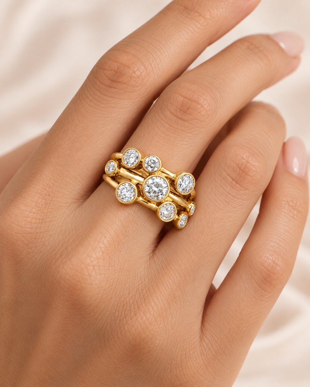 Model hand wearing GeMMs & Co 9ct yellow gold lab-grown diamond bubble ring — illustrative lifestyle photograph #metal_9ct-yellow-gold