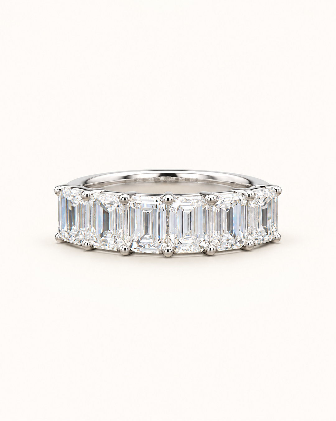 1.75ct emerald-cut lab-grown diamond half eternity ring in 9ct white gold on clean cream background — illustrative product render
