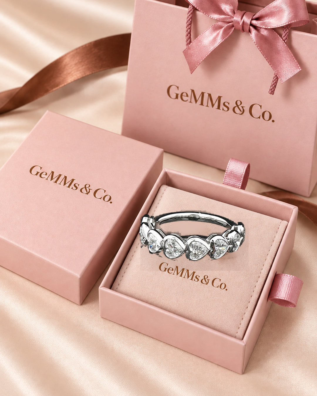 Correct white-gold heart-cut ring in GeMMs & Co pink packaging #metal_9ct-white-gold