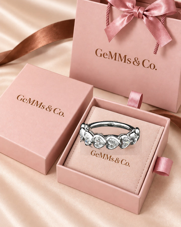 Correct white-gold heart-cut ring in GeMMs & Co pink packaging #metal_9ct-white-gold