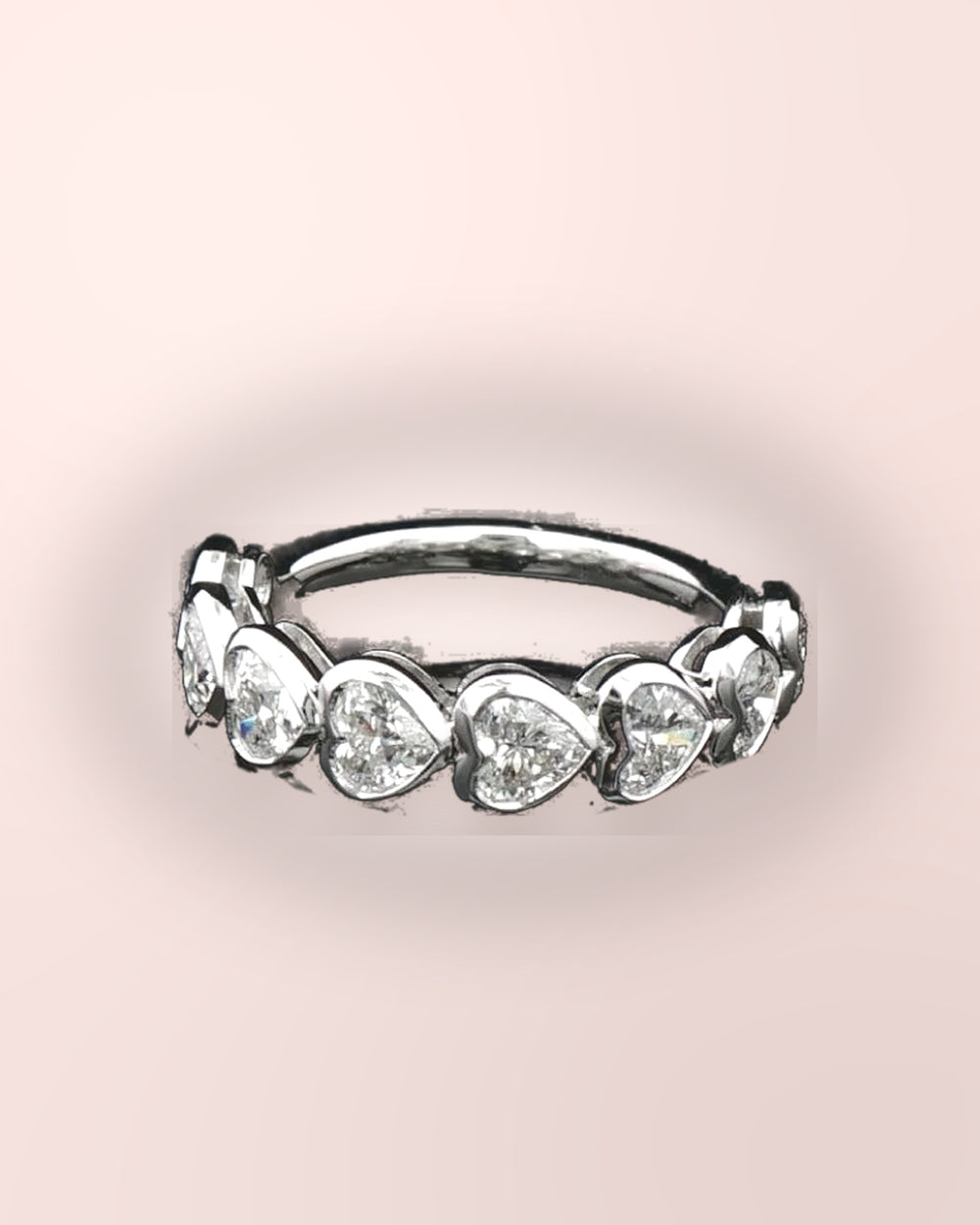 Heart-cut diamond half eternity ring in white gold on blush #metal_9ct-white-gold