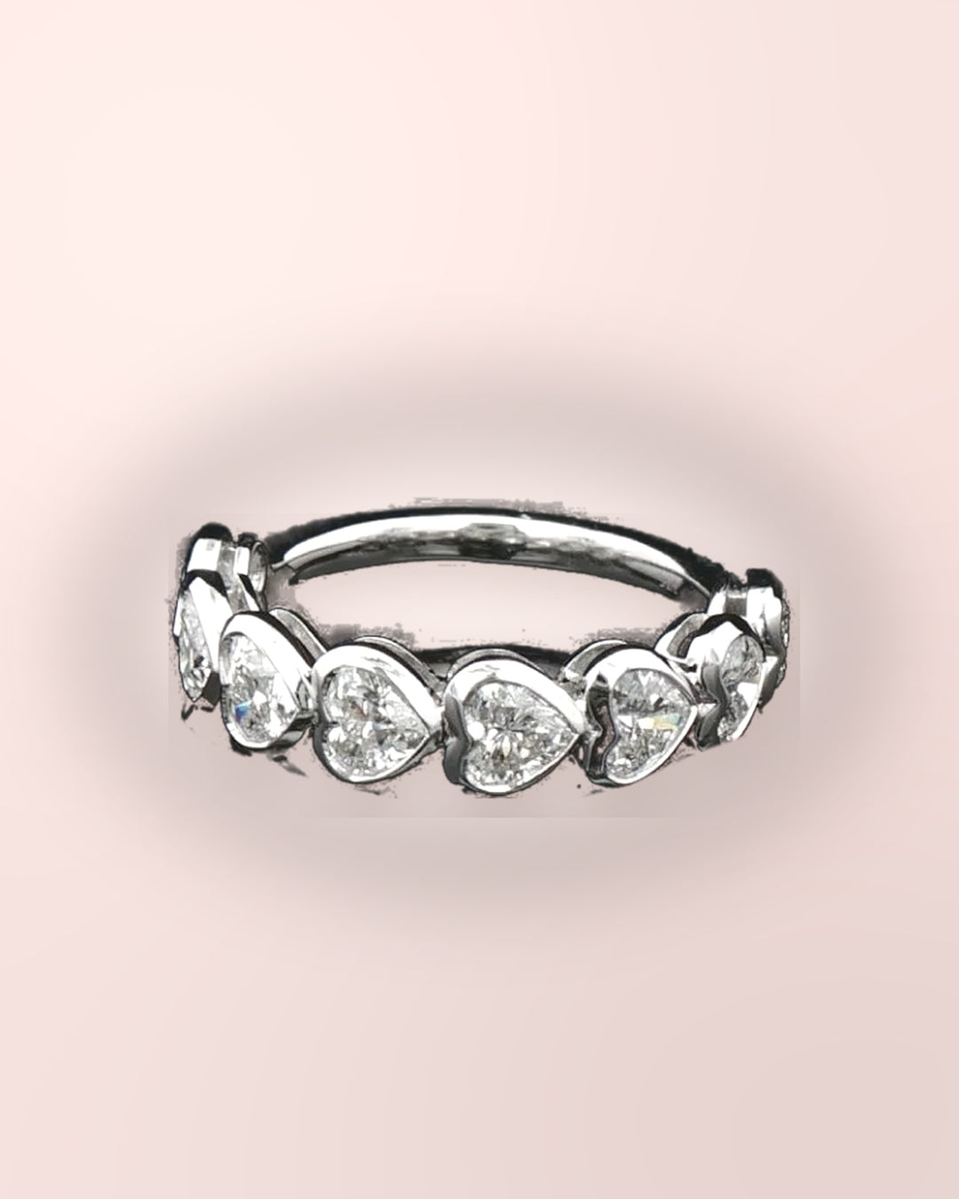 Heart-cut diamond half eternity ring in white gold on blush #metal_9ct-white-gold