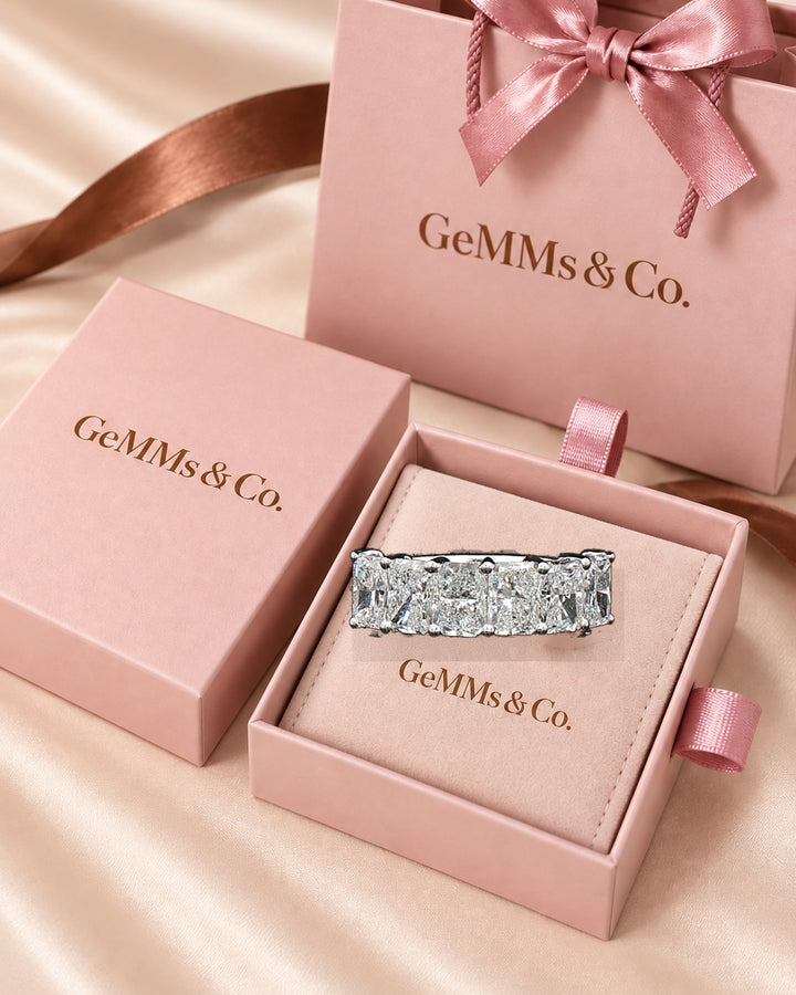 Correct radiant-cut eternity diamond ring in GeMMs & Co signature pink jewellery packaging #metal_9ct-white-gold