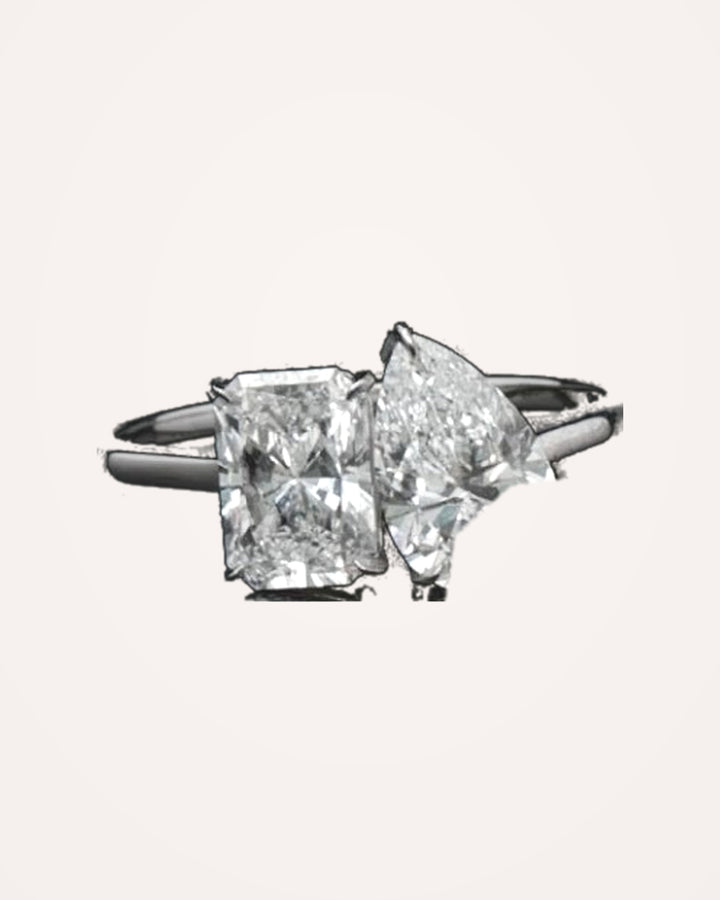 Close-up of pear and radiant lab-grown diamonds #metal_18ct-white-gold