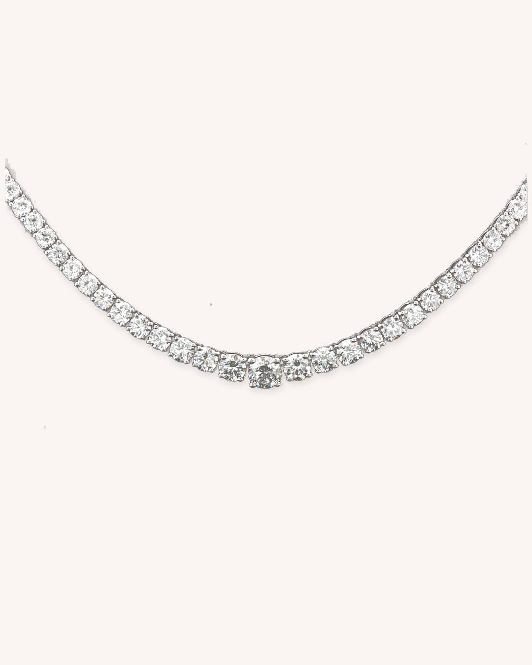 Graduated Lab-Grown Diamond Tennis Necklace in 18ct White Gold on cream background #metal_18ct-white-gold
