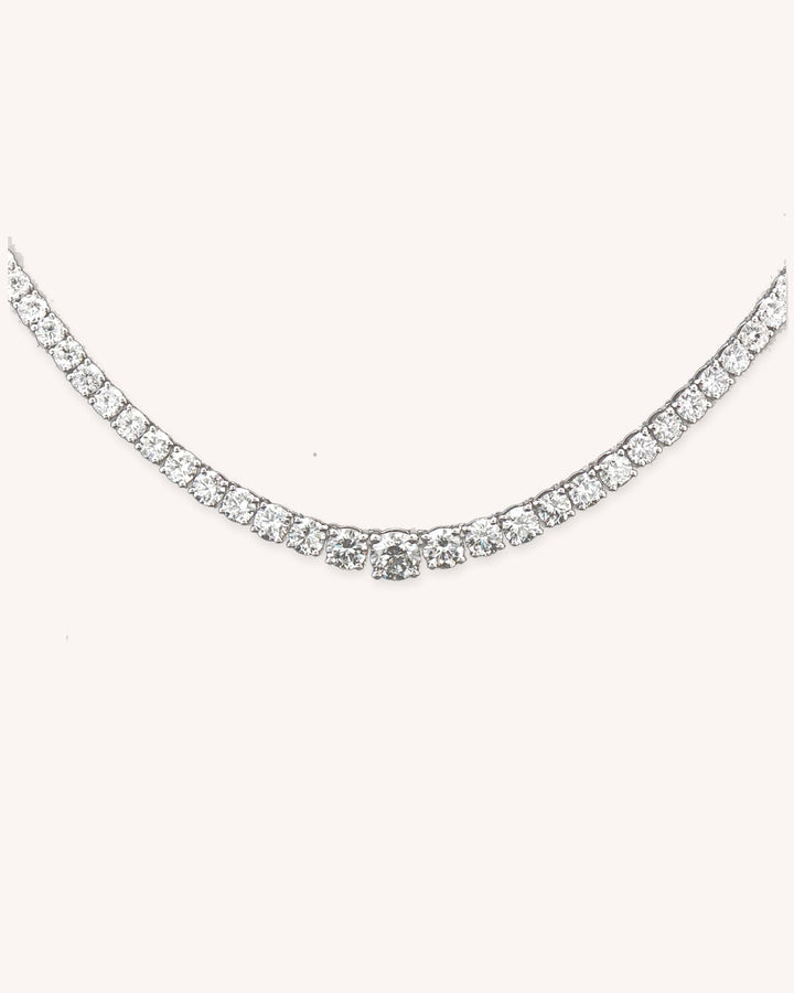 Graduated Lab-Grown Diamond Tennis Necklace in 18ct White Gold on cream background #metal_18ct-white-gold