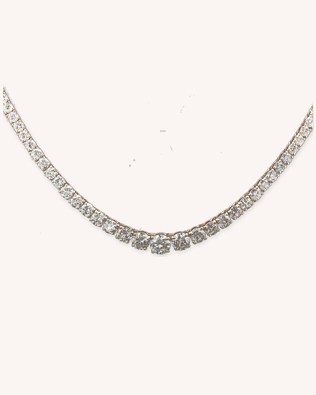 Graduated Lab-Grown Diamond Tennis Necklace in 9ct Yellow Gold on cream background #metal_9ct-yellow-gold
