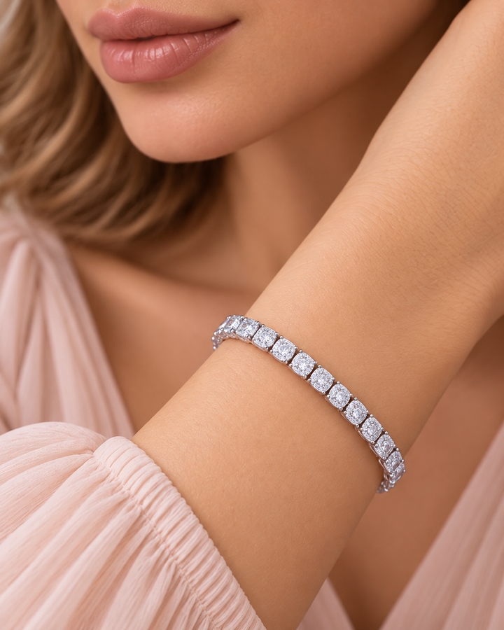 Hidden-lock tennis bracelet worn by elegant model, lips and chin only, portrait
